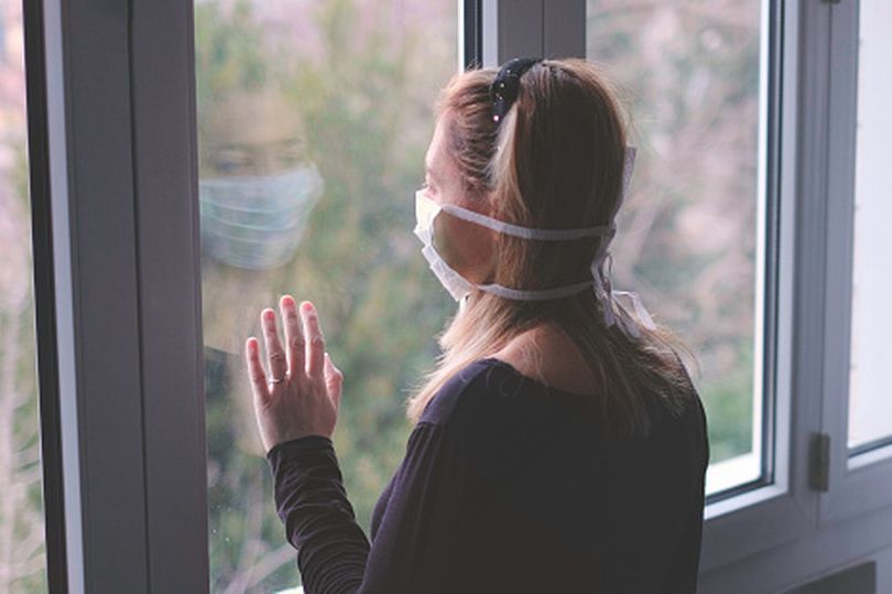 Young woman contemplating moving home